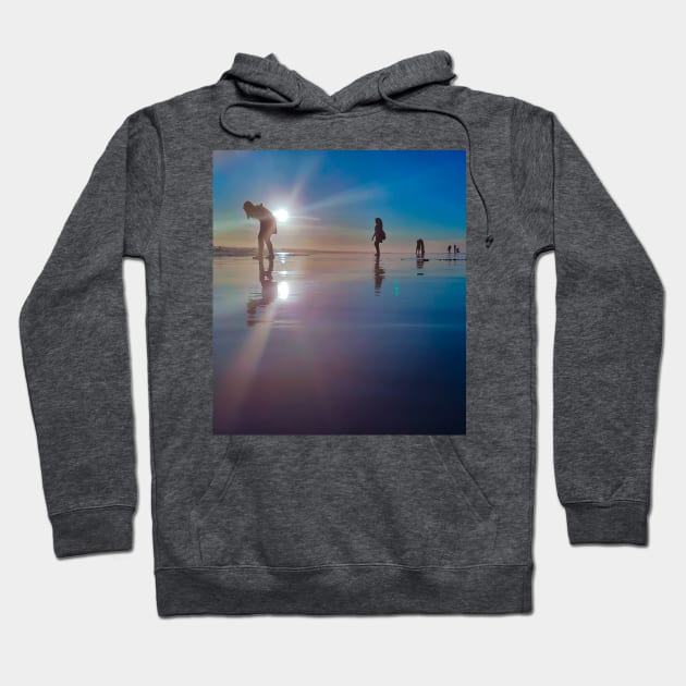 Copy of Silhouetted people in a row on a sand beach. Hoodie by kall3bu